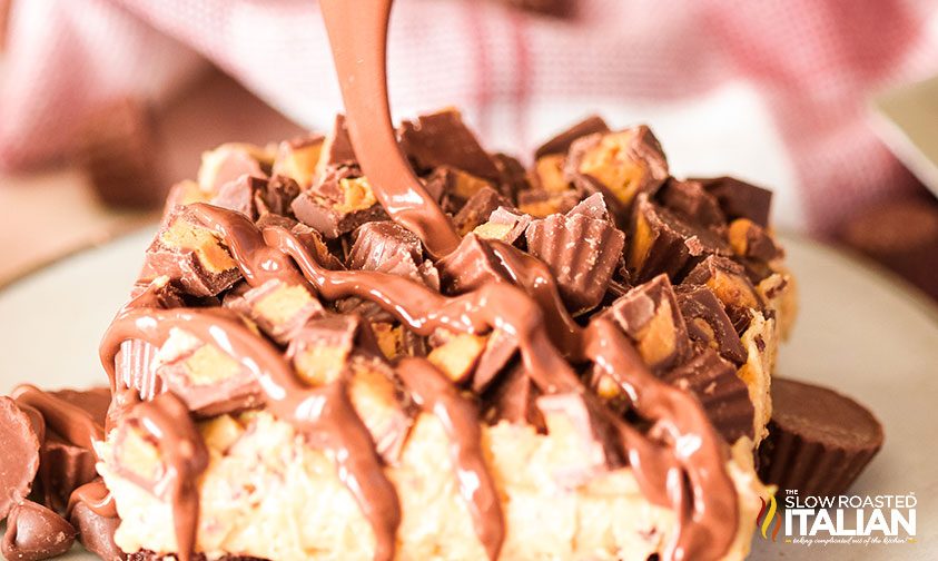 chocolate being drizzled over Peanut Butter Fudge Frosted Brownies