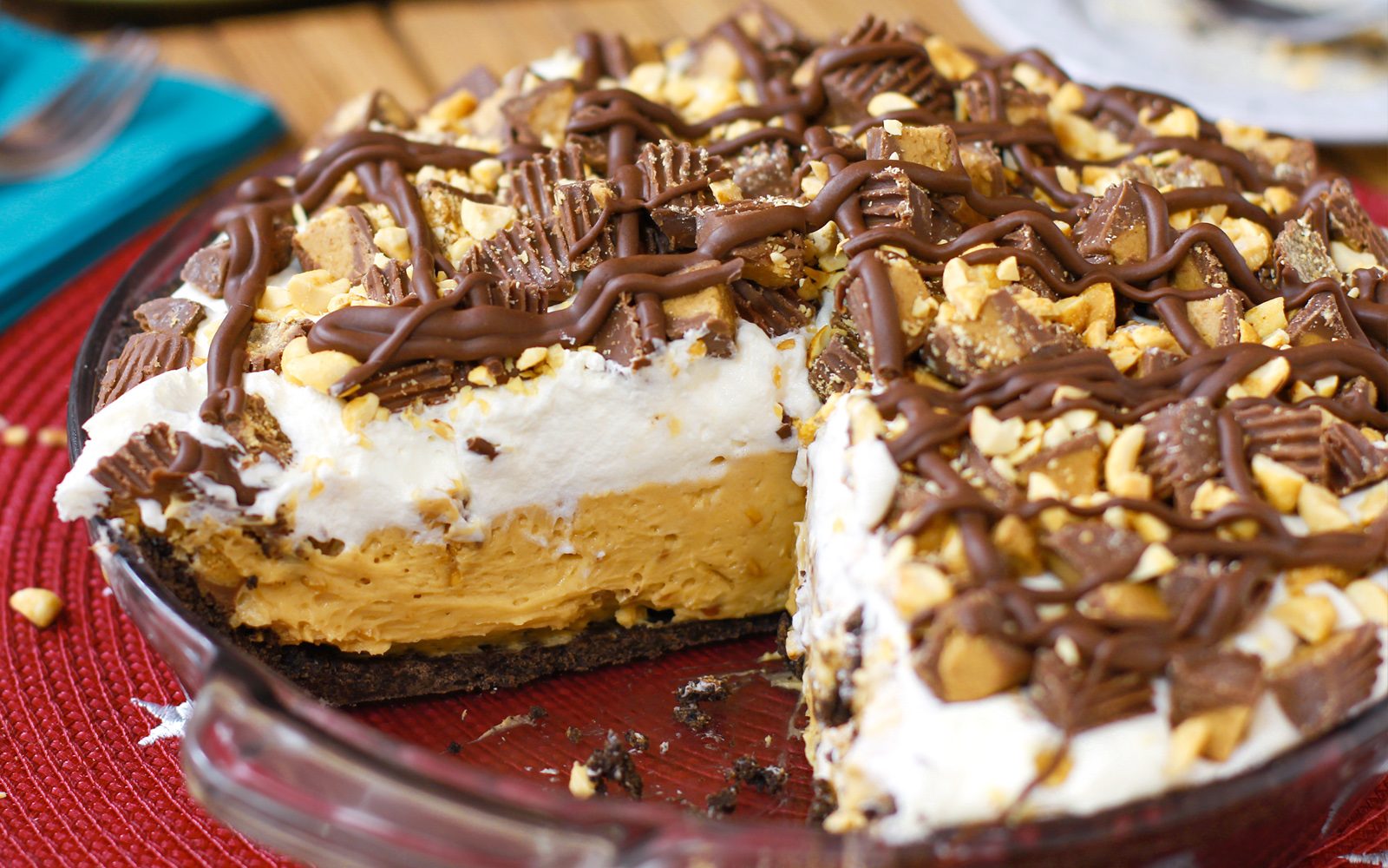 Reese's Peanut Butter Pie with a slice cut out
