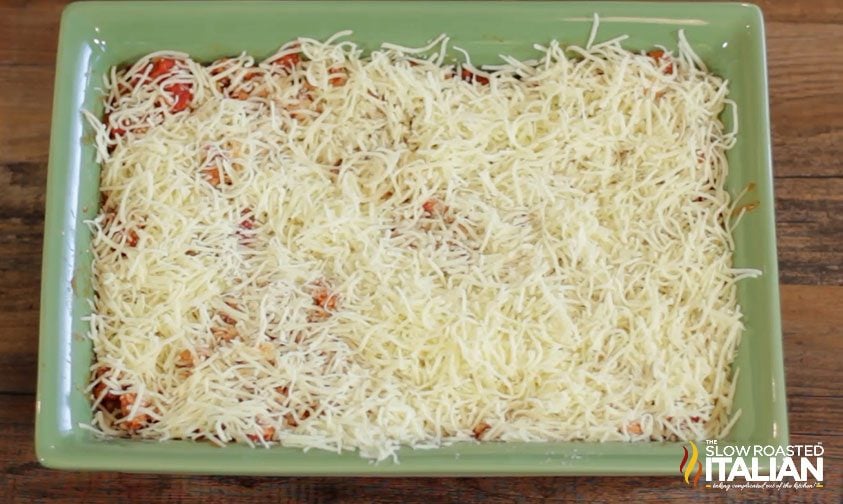 mozzarella cheese on almost done lasagna