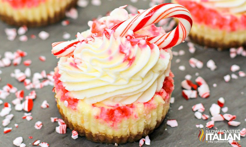 cheesecake up close with candy cane bits scattered around