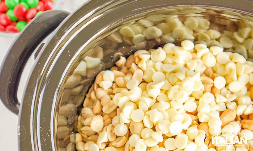 peanuts and white chocolate chips in slow cooker