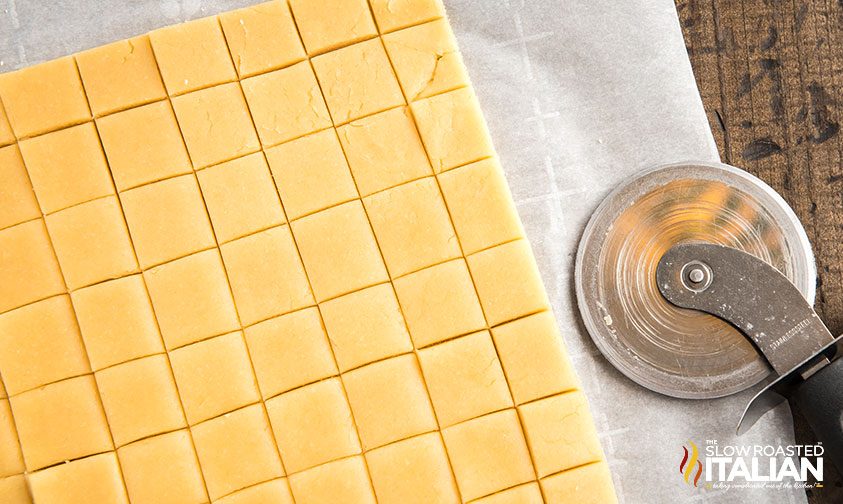 sugar cookie dough cut into squares