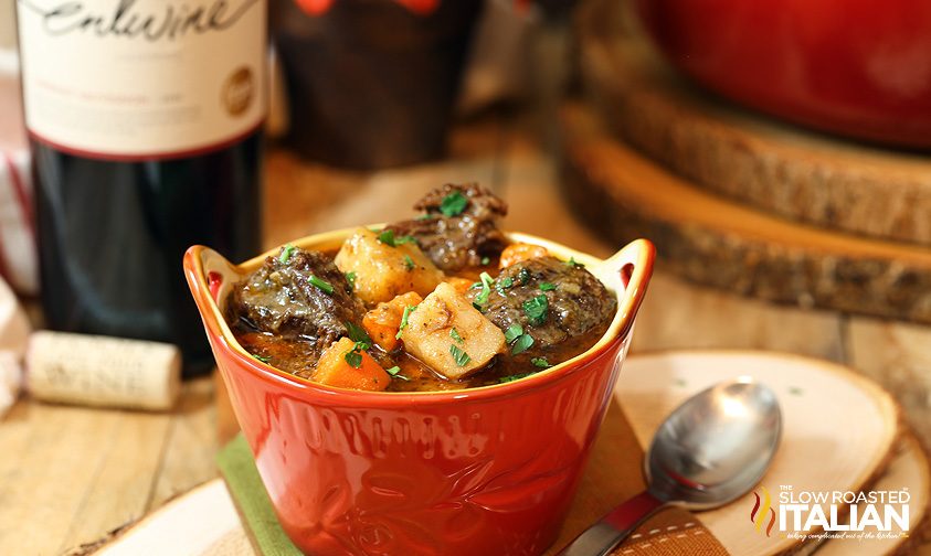 zoomed out picture of beef soup in bowl