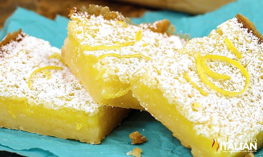 3 homemade lemon bars, slightly stacked