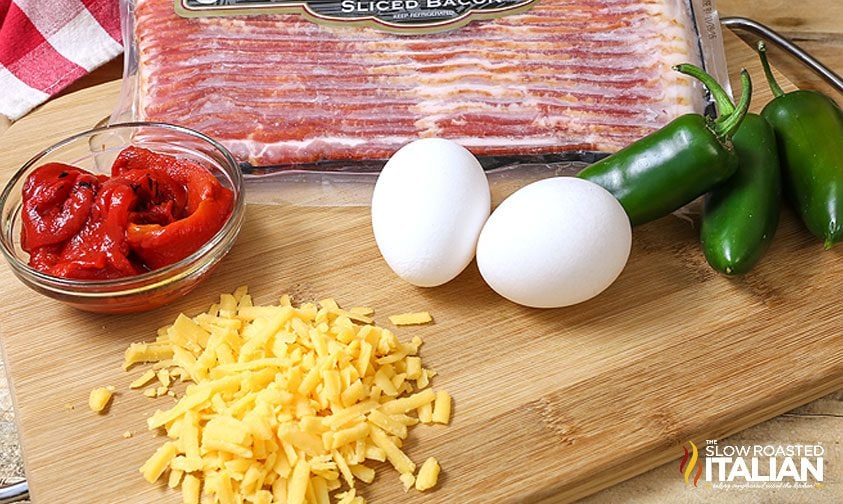 ingredients on kitchen counter to make a bacon egg and cheese stuffed bread recipe