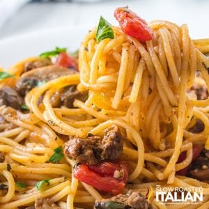 pasta bolognese on fork