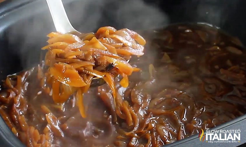 ladle of slow cooker french onion soup