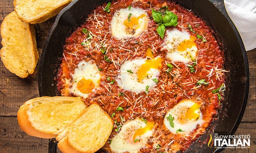 Baked Eggs in a skillet of sauce