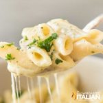 mac and cheese on fork with dripping cheese