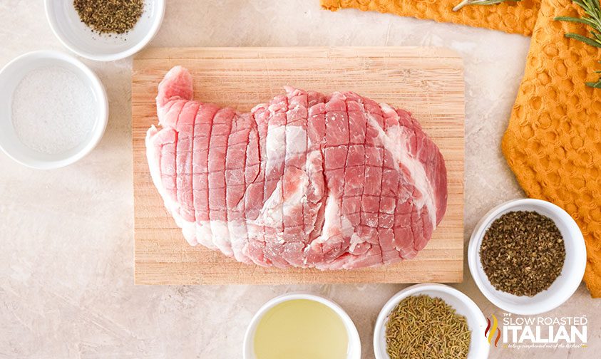 overhead: boneless pork roast and ingredients for pork roast recipe