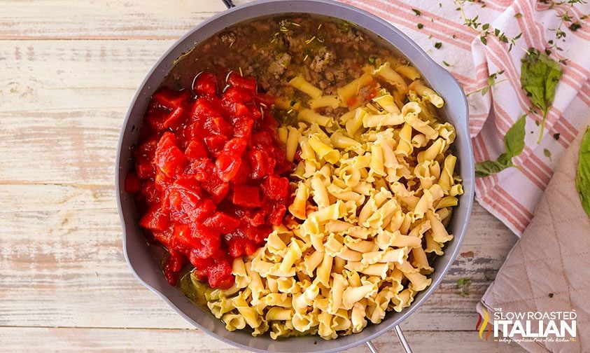 pasta and tomatoes added to beef