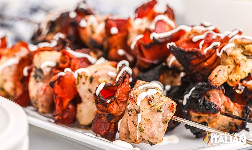Chicken Kabobs with Bacon and ranch drizzled over top