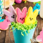 easter sugar cookies in a small blue pail