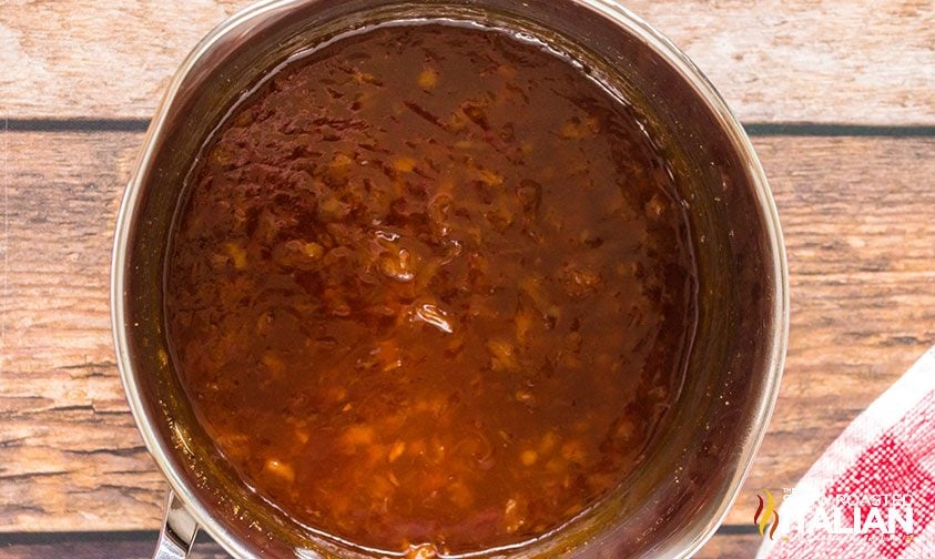 barbecue sauce with pineapple in a pan