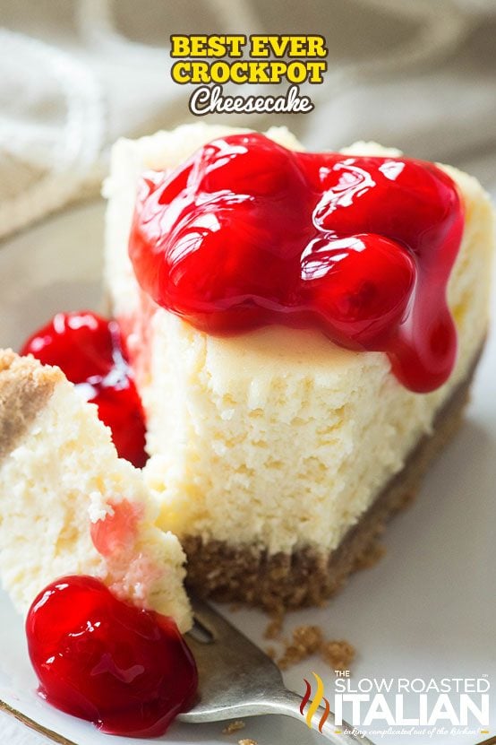 cheesecake on a plate with cherries on top