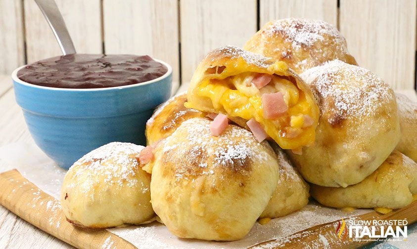 stack of cheesy monte cristo bombs with ooey gooey cheese