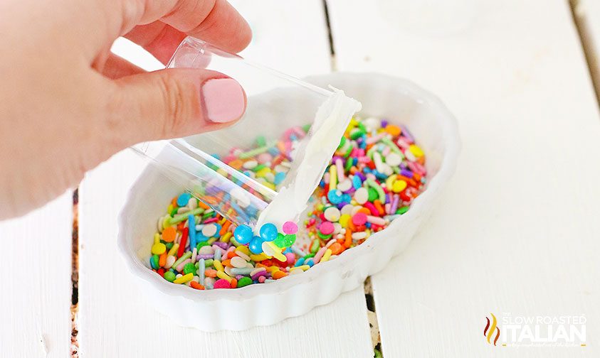 Rimming the glass with sprinkles