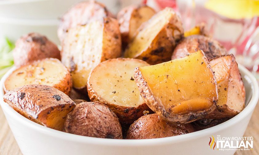 red creamer potatoes in white dish