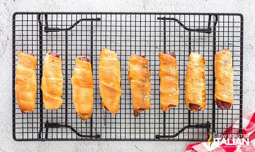 pigs in a blanket on a cooling rack