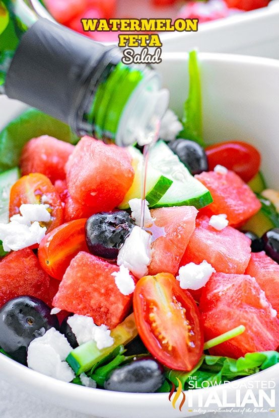 watermelon feta salad with dressing on top