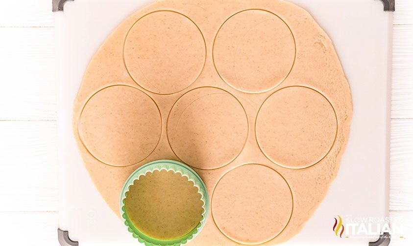 cutting rounds out of pie dough