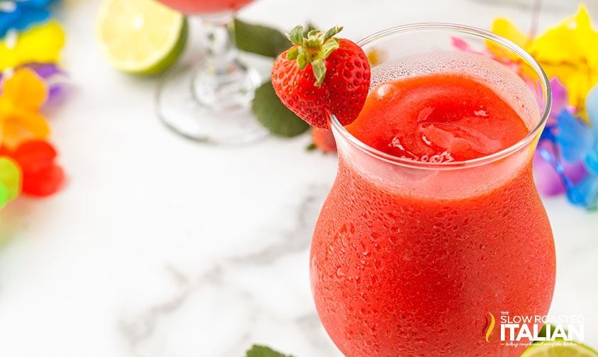 A close up of a glass of Strawberry Daiquiri