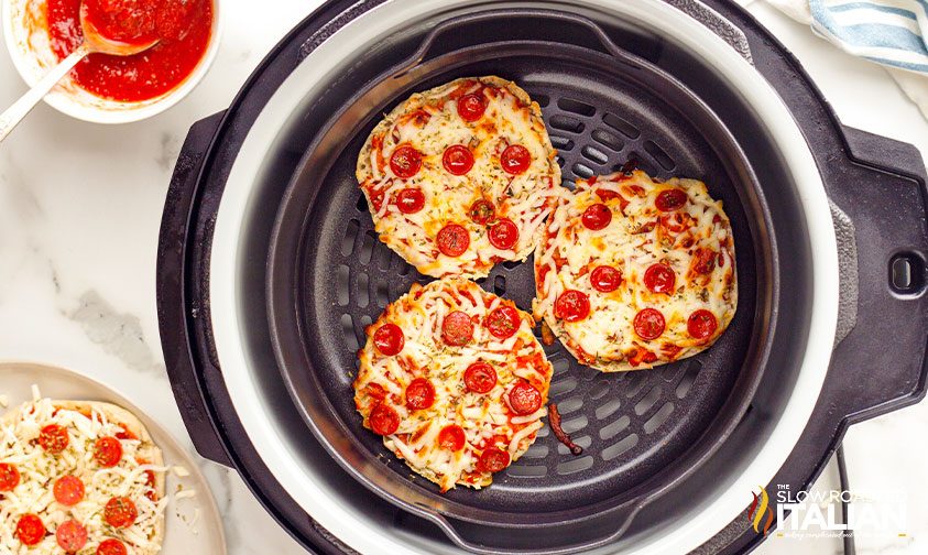 English muffin pizzas in air fryer basket