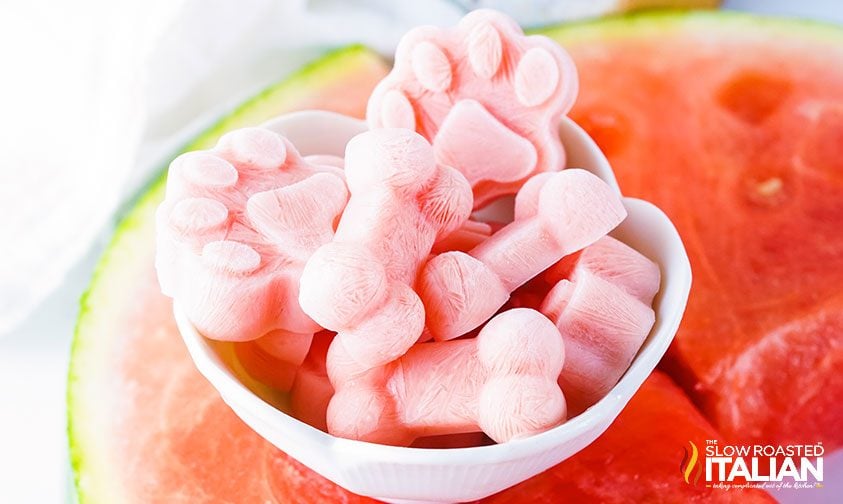 Frozen Watermelon Dog Treats in a bowl on top of a watermelon