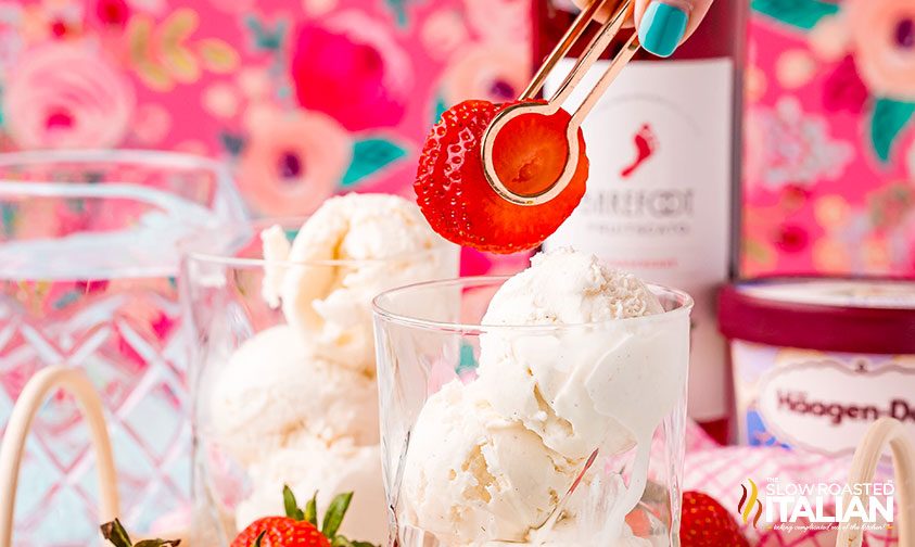 adding strawberries to wine ice cream float