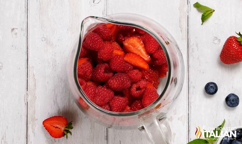 fresh berries in pitcher