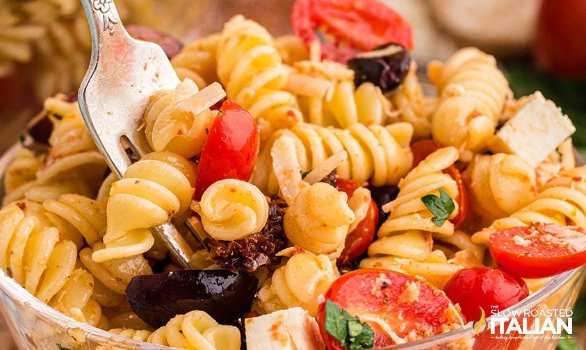 forkful of tomato feta pasta salad, close up