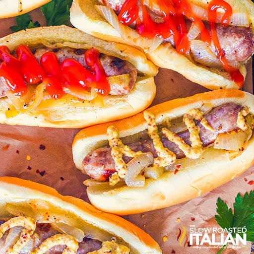 crockpot beer brats in buns with condiments
