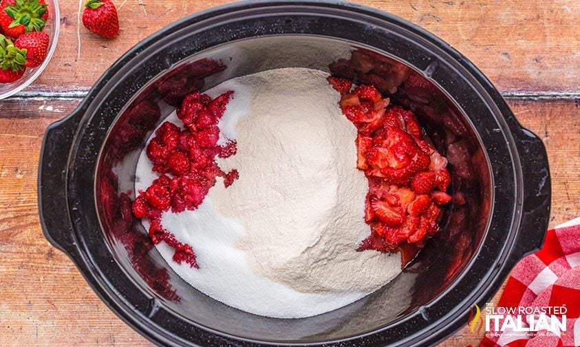 pectin and sugar and fresh berries in slow cooker