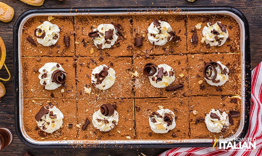 tiramisu cut into squares in pan