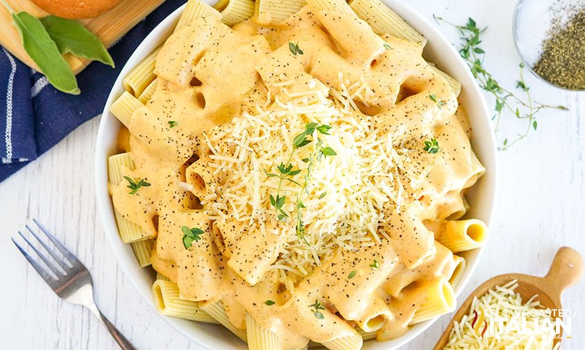 pasta with pumpkin sauce and cheese on top