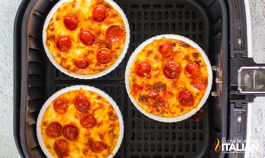 ramekins of pizza dip in an air fryer