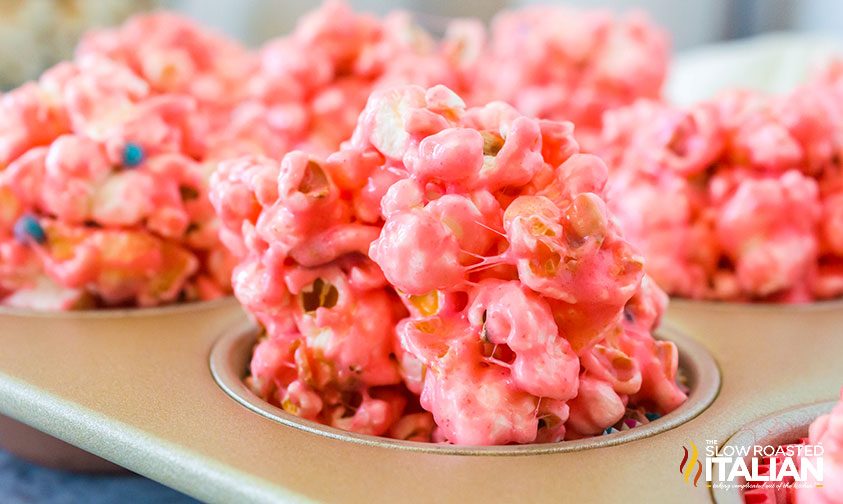 strawberry popcorn balls in muffin tin