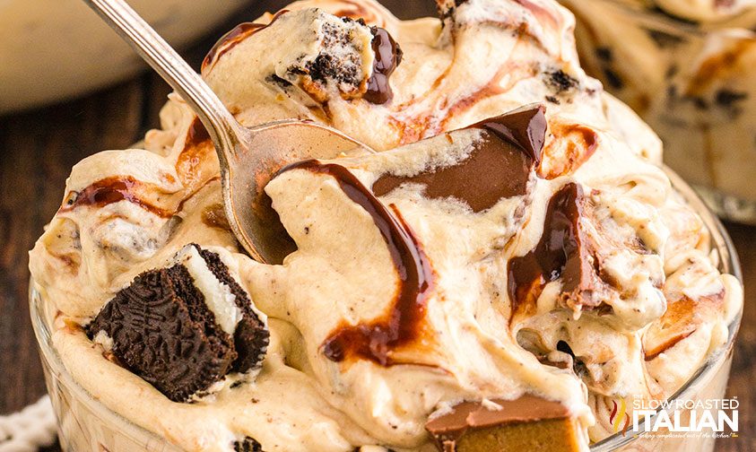 chocolate peanut butter cream cheese dessert in bowl with spoon