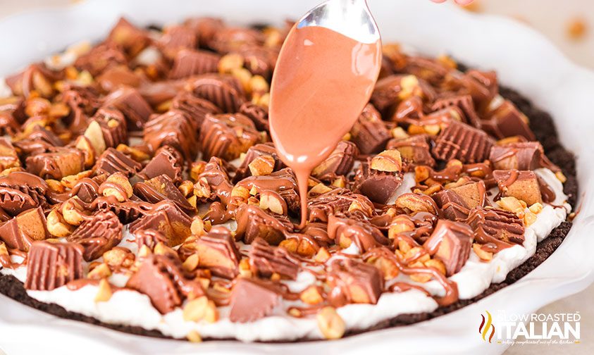 drizzling chocolate onto Reese\'s no bake pie
