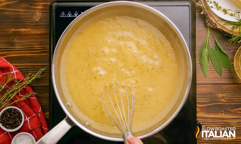 turkey gravy bubbling in a pot