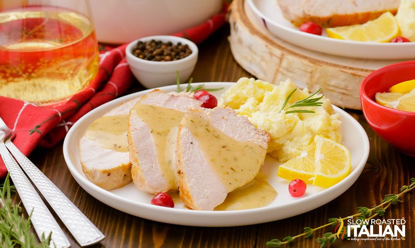 slices of roasted turkey with gravy