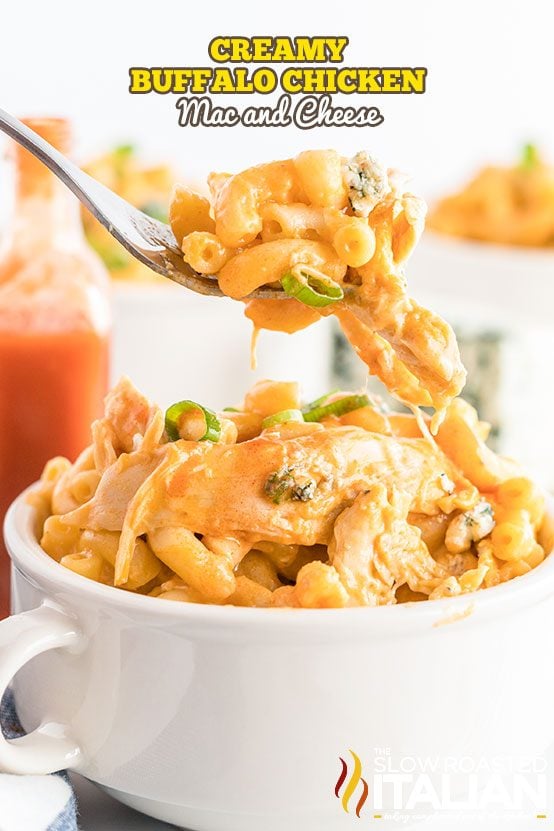 buffalo chicken mac and cheese on a fork with a bowlful beneath