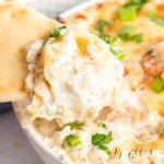 scoop of hot shrimp dip