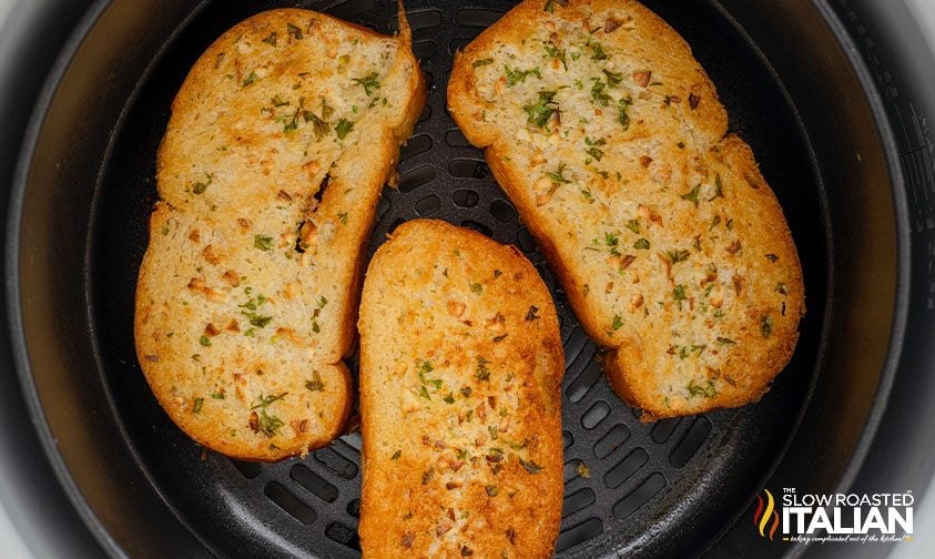 3 slices air fryer garlic bread, in air frying basket
