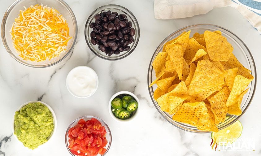 ingredients in bowls for nachos recipe