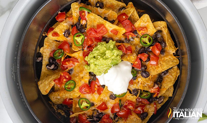 black bean nachos with guac and sour cream