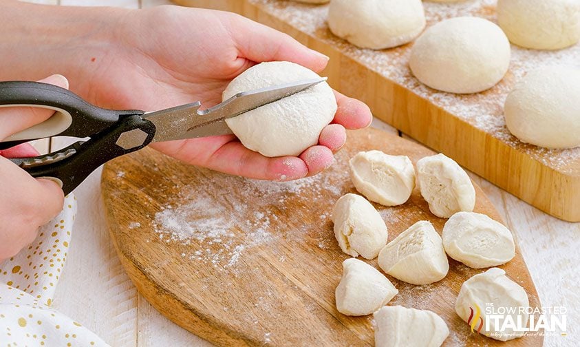 cutting up dough for pull apart bread recipe