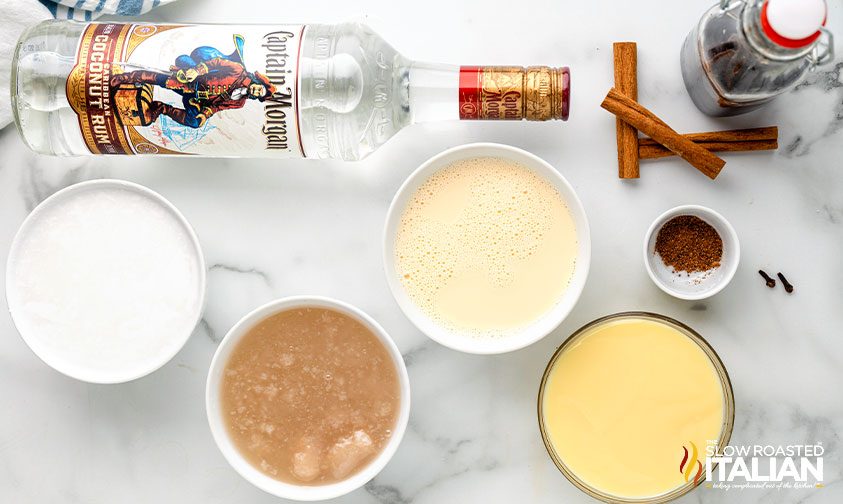 coquito recipe ingredients in small bowls