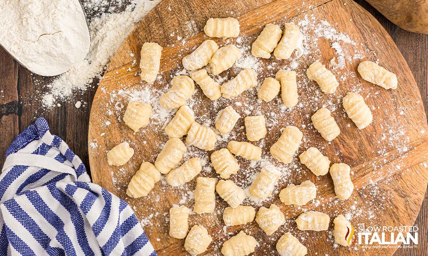 potato gnocchi uncooked on a cutting board