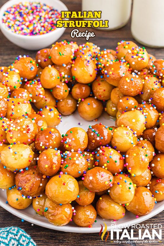 Italian struffoli on a white plate